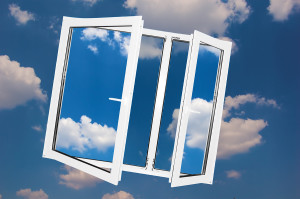 Window on sky background. Shining clean glasses contast with sky.