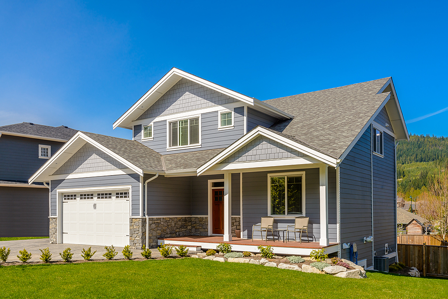 A perfect neighbourhood. Houses in suburb at Summer in the north America. Luxury houses with nice landscape.
